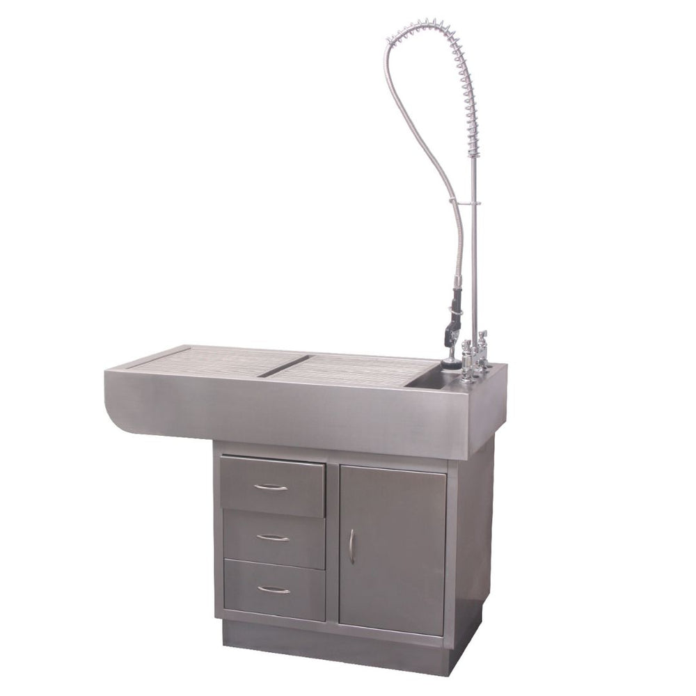 Modern Stainless Steel Prep Table with Left-Handed Storage (ABK Grooming): An image of a veterinarian using the Aeolus FT-851L-SS Preparation Table from ABK Grooming. The table features a stainless steel top, with storage drawers and cabinet on the left side. Upgrade your veterinary clinic with a functional and organized prep table! Shop Now at ABK Grooming.