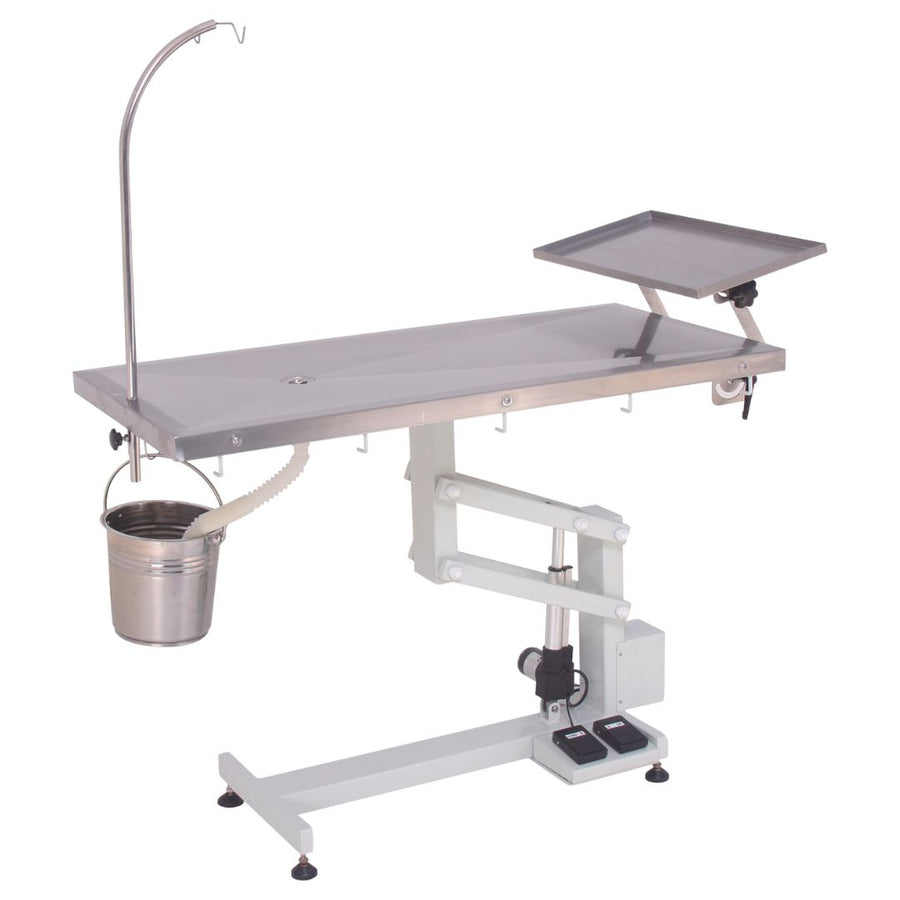 Electric Pet Surgery Table for Comfort & Efficiency (ABK Grooming): A veterinarian performing surgery on a pet securely positioned on the Aeolus Omega Eco Electric Pet Operation Table from ABK Grooming. This electric table offers precise height adjustment and a stainless-steel tabletop for optimal comfort and surgical precision. Shop Now at ABK Grooming!